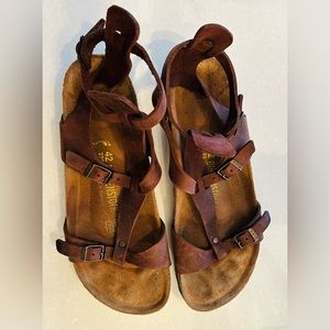 Barely worn gladiator style Birkenstocks size 42. Rich brown.